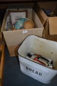 Box Containing Enamel Bread Bin, Decorative Wall Plates, Framed Picture, Samsung Camera, etc.