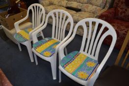 Set of Three White Plastic Garden Chairs
