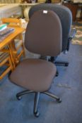 Brown Upholstered Swivel Office Chair