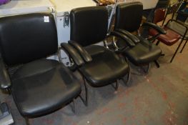 Set of Three Black Upholstered and Chrome Office Armchairs