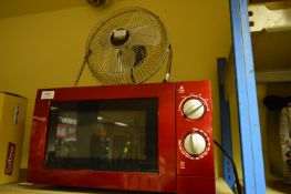 Domestic Microwave Oven and a Cooling Fan