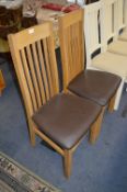 *Pair of Oak Stickback Dining Chairs with Brown Faux Leather Seats