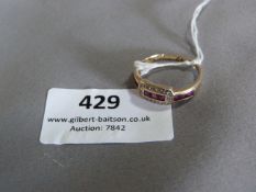 9cT Gold Ring Set with Ruby Coloured Stones