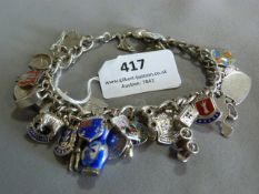 Silver Charm Bracelet with Enameled Charms Approx. 69.8g