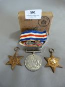 WWII Medals Group of Three; Campaign, 3945 Star and Africa Star Plus a Box of Ribbons