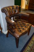 Brown Leather Buttoned Captains Chair