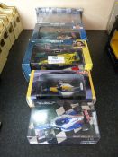 Five Boxed Diecast Model Racing Cars