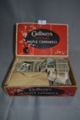 Cadburys Chocolate Box Containing a Collection of Wills Cigarette Cards