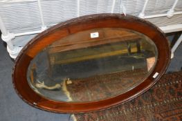 Mahogany Oval Framed Bevelled Edge Wall Mirror