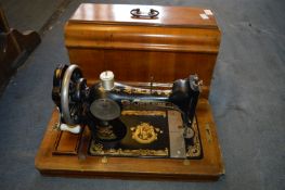 Walnut Cased Frister & Rossmann Sewing Machine