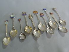 Ten Hallmarked Silver Collector's Spoons Approx. 122g