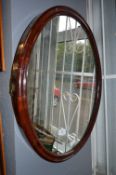 Mahogany Oval Framed Mirror