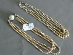 Two Pearl Necklaces