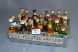 Forty Miniature Whiskey Bottles