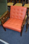 Teak Framed Armchair with Orange Vinyl Buttoned Seat and Back