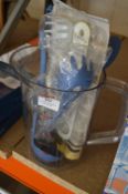 Plastic Jug Containing Assorted kitchen Tools