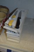 Seven Boxes of Sharp Knives