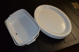 Two Rectangular Roasting Dishes and Thirteen Oval Platters