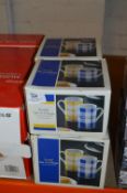 Six Boxes Containing Four Blue & Yellow Scottie Mugs