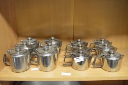 Twelve Stainless Steel Teapots