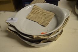 Three Circular Eared Serving Dishes