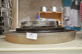 Twelve Cake Tins and a Pack of Chefs Moulds