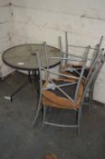*Circular Table with Four Chairs