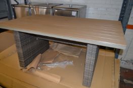 *George at Home Rattan Style Patio Table with Composite Wood Top