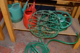 Hose Pipe on Reel, Plant Stays and Two Watering Cans