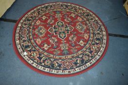 Small Circular Red Floral Patterned Rug 4'4