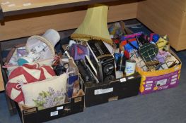 Four Boxes Containing Table Lamps, Radios, Kitchen Items, Cushions, etc.
