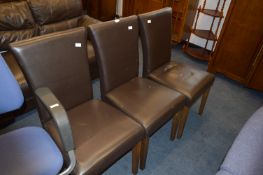 Three Faux Leather Highback Dining Chairs