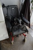Battery Operated Invacare Wheelchair with Charger and Recently Installed Batteries