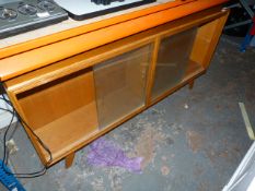 Teak Display Cabinet Enclosed by Sliding Glass Doors