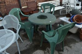 Circular Table with Three Stackable Garden Chairs