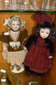 Two Porcelian Headed Dolls