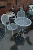 Circular Patio Table with Two Matching Chairs and a Cast Iron Umbrella Stand