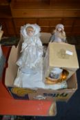 Box of Table Linen, Two Porcelian Head Dolls and Wade Bell's Whiskey Decanter