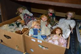 Two Boxes Containing a Large Quantity of Porcelain Headed Dolls