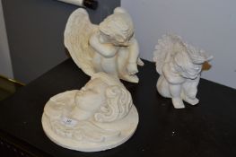 Two Pottery Figurines and a Wall Plaque 