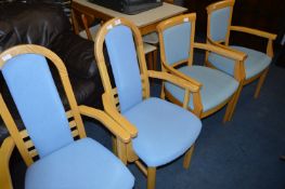 Two Pairs of Beech Framed Blue Upholstered Dining Armchairs
