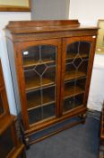 Oak Bookcase with Lead Glass Doors
