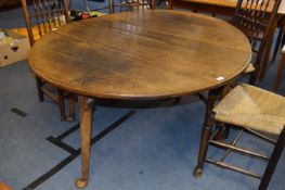 Georgian Oak Circular Gateleg Dining Table on Padded Feet