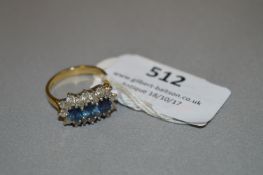 18 Carat Gold Ring set with Blue & White Stones
