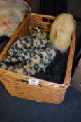 Basket containing Vintage Fur Hats and Clothing
