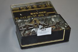 Black Magic Tin containing Selection of Vintage Keys