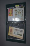 Album containing First Day Cover Stamps