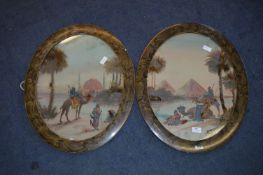 Pair of Oval Framed Oil Paintings Depicting Egyptian Scenes