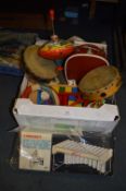 Box containing Tambourines, Spinning Top, Wood Blocks, Small Case etc