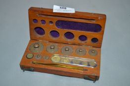 Mahogany Cased Set of Brass Weights
